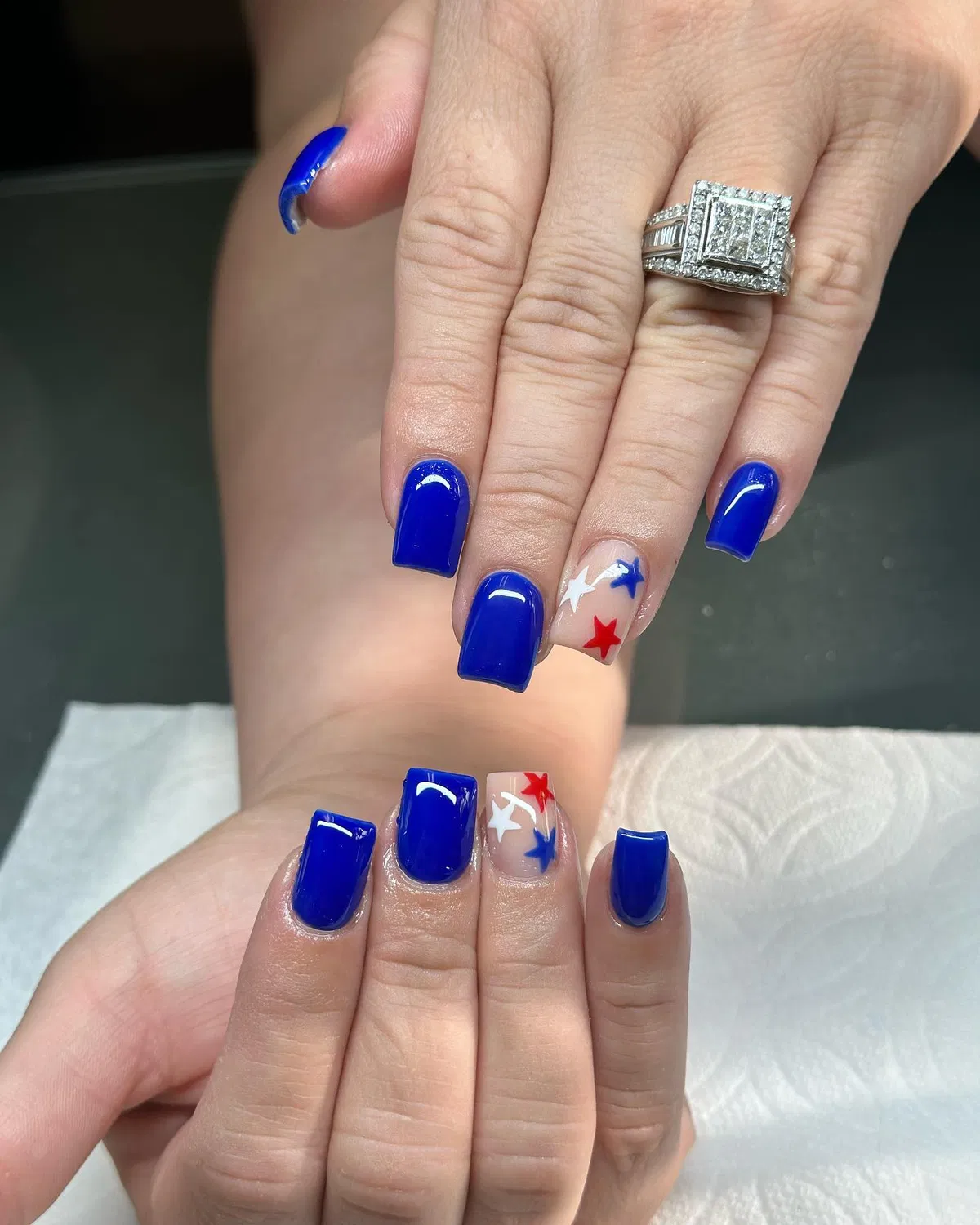 Deep blue set with nude star accent nails