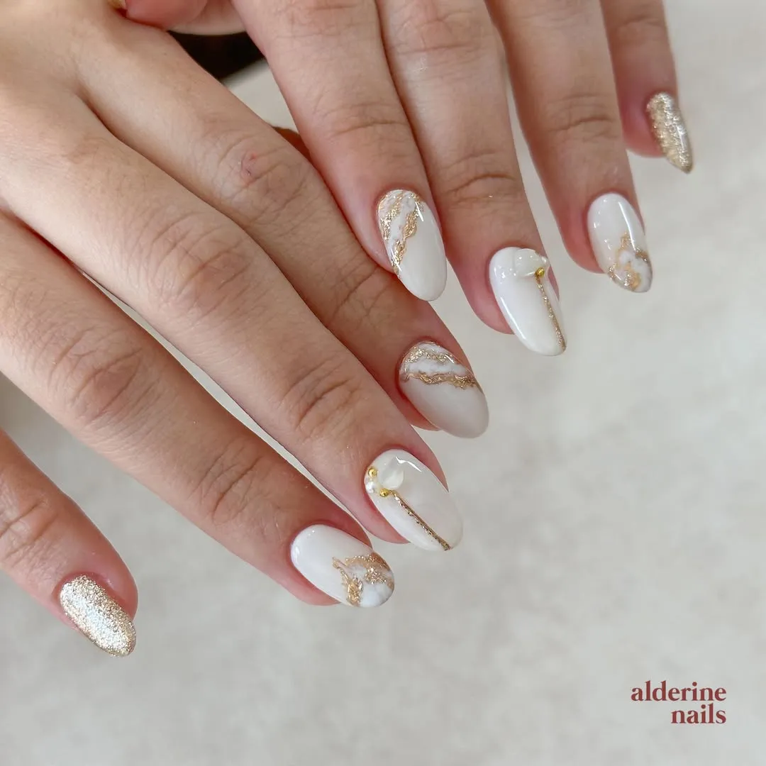 Milky white mix with gold glitter and gold veining