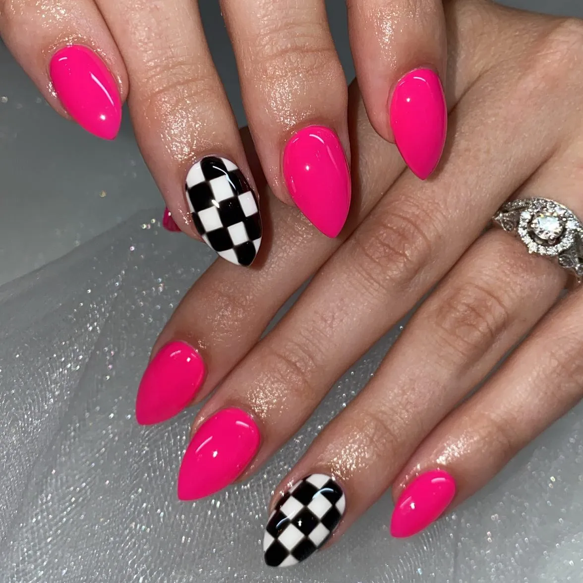 Hot pink set with black-and-white checkered nails