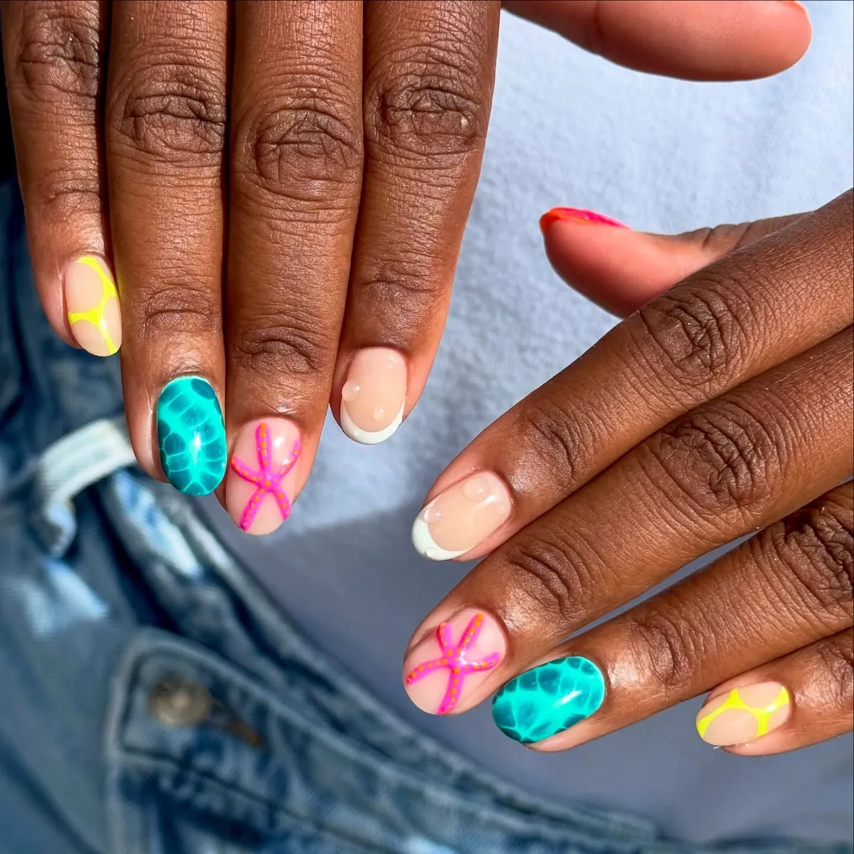 Teal ripple nails with pink starfish accents