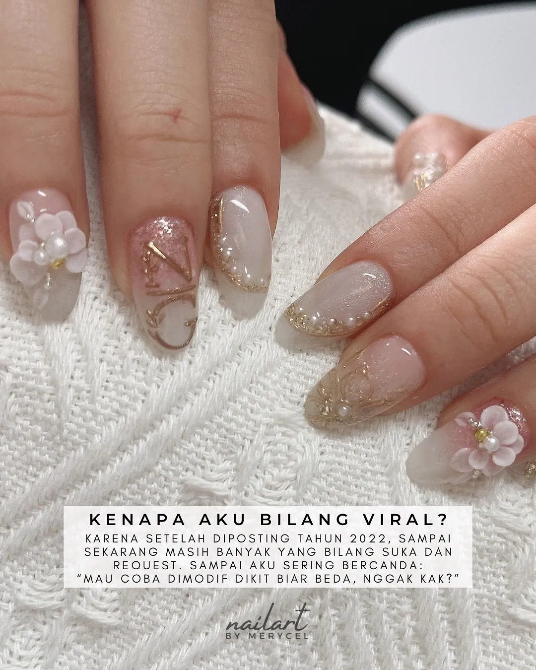 Milky nude nails with gold detailing and 3D flowers (with text overlay)