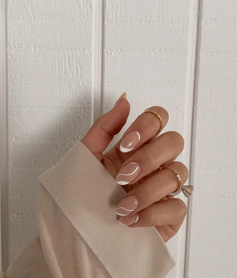 Nude almond nails with minimal white curved line art