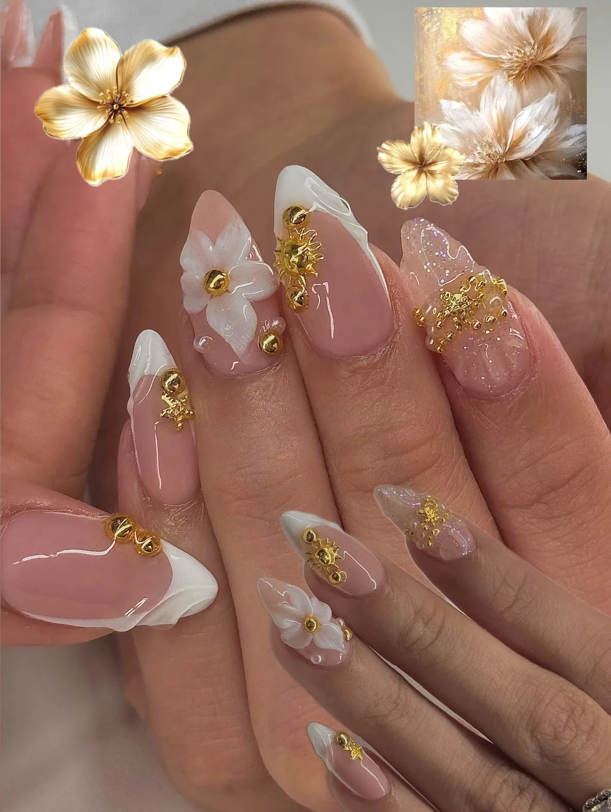 French tips with gold studs, star accents, and gold flake clusters