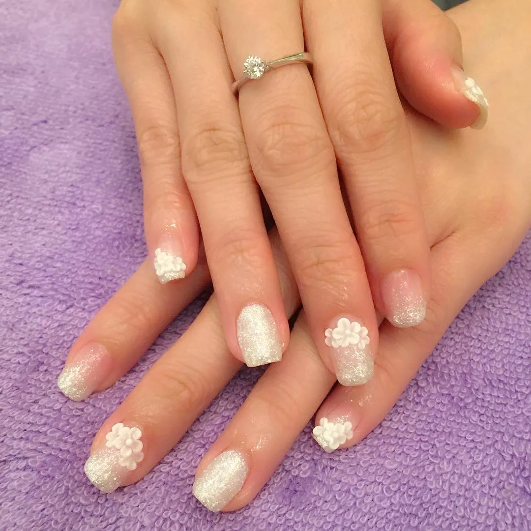 White glitter squares with 3D flower accents
