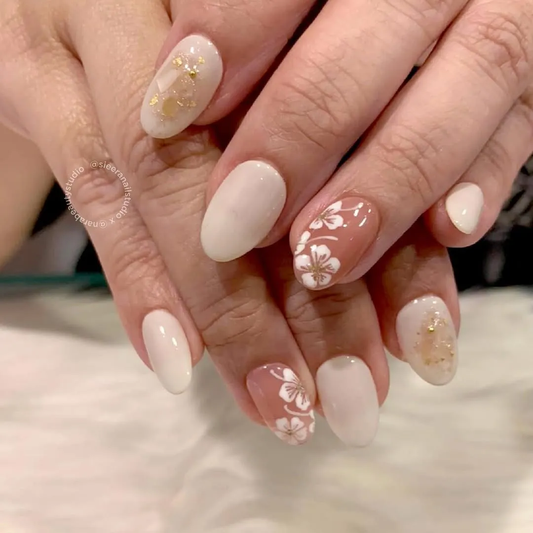Creamy neutrals with brown floral accents and gold flecks