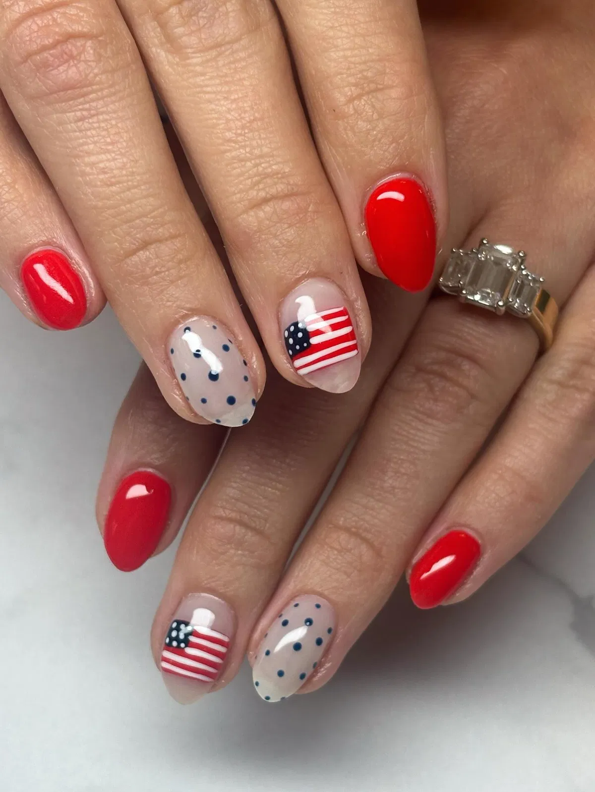 Bright red set with dotted and striped accent nails