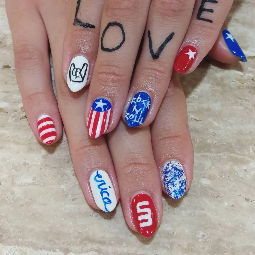 Graphic text and icon nails in red, white, and blue