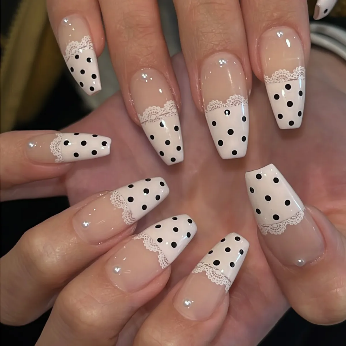 Coffin nails with lace-edged polka dot French tips