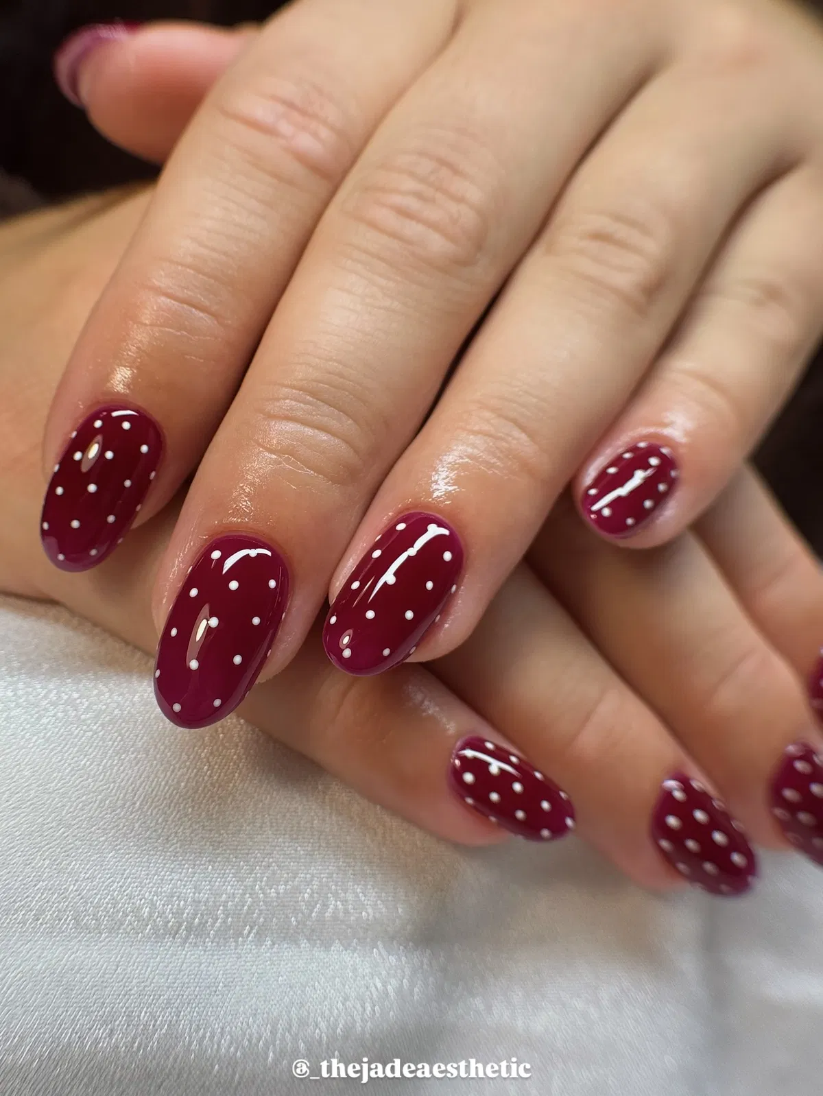 Burgundy Nails with White Polka Dots