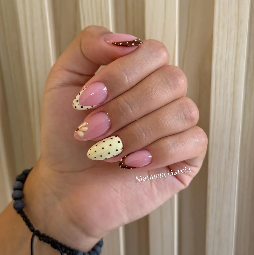 Brown-and-yellow polka dots with contrasting dotted French tips