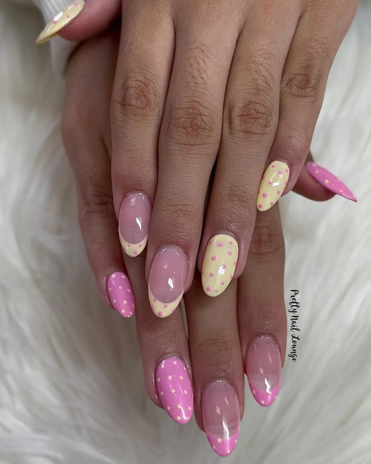Pink and pale-yellow polka dot mix with French tips