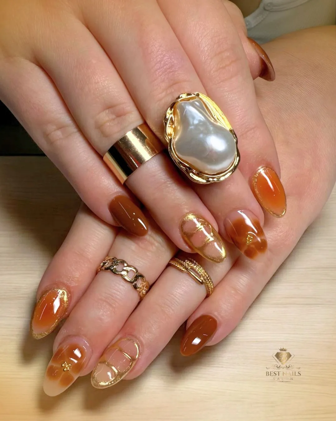 Warm brown gloss with gold glitter edging