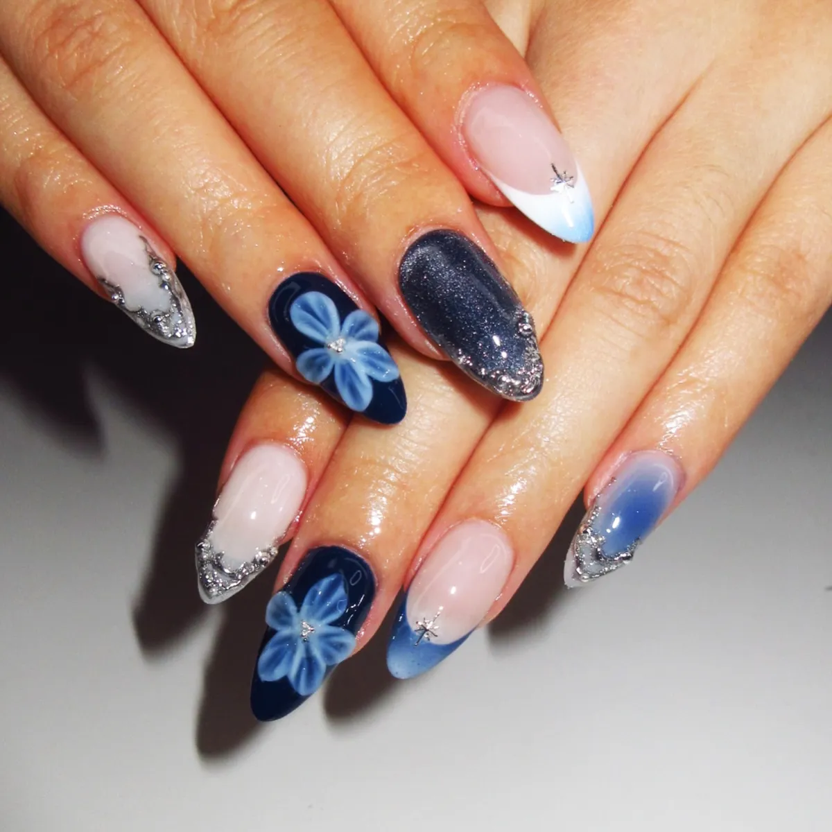 Floral navy accents with silver glitter-like tips