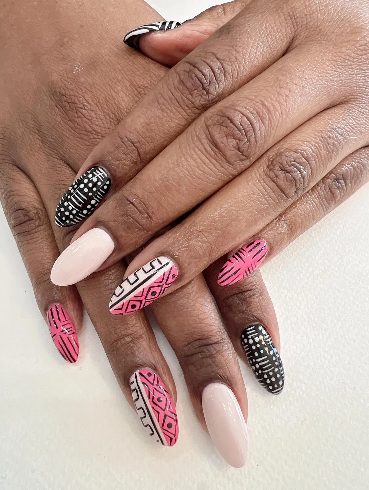 Black solids with pale pink grid accents