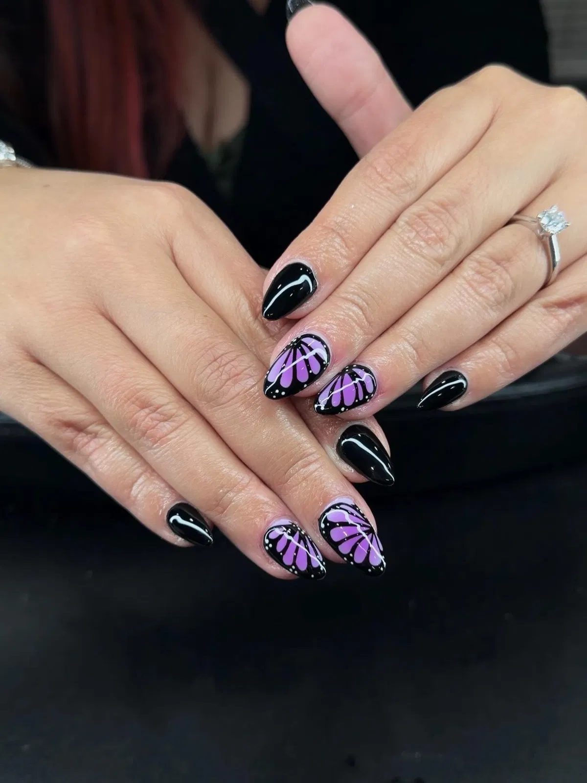 Glossy Black with Purple Wing-Pattern Accent Nails