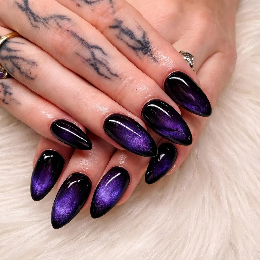 Black-to-purple center-glow nails