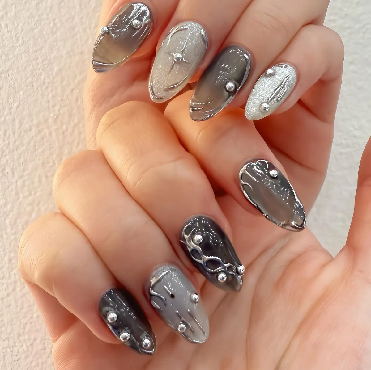 Gray-to-Silver Sculpted Nails with Stud Accents