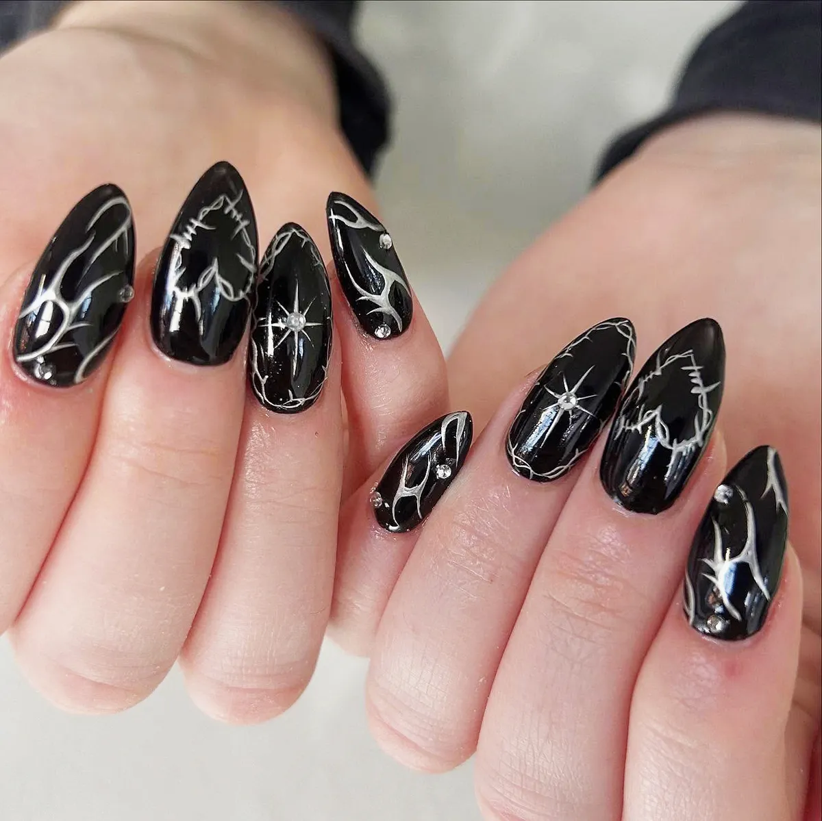 Glossy Black with Silver Branching Lines and Starbursts