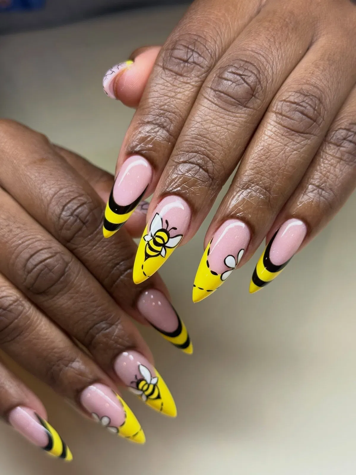 Bee illustrations with yellow tips and black curved stripes