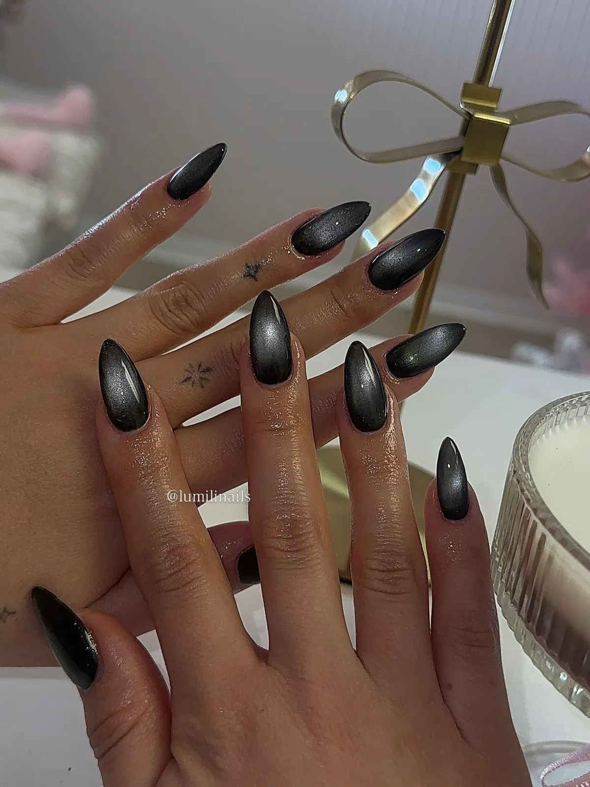 Glossy Black Cat-Eye Almond Nails (Minimal Design)