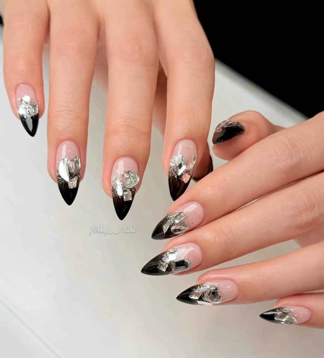 Black French tips with silver shard glitter