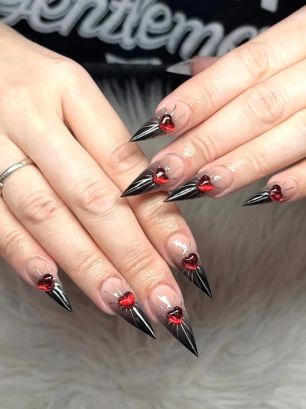 Mixed black ombre tips with stars and marbled accents