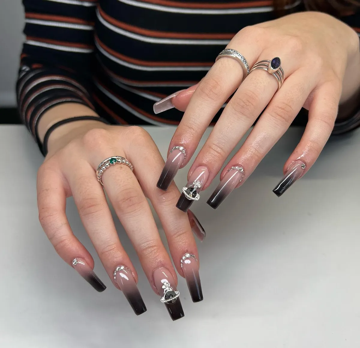 Stiletto Black Ombre Nails with Red Heart Starbursts