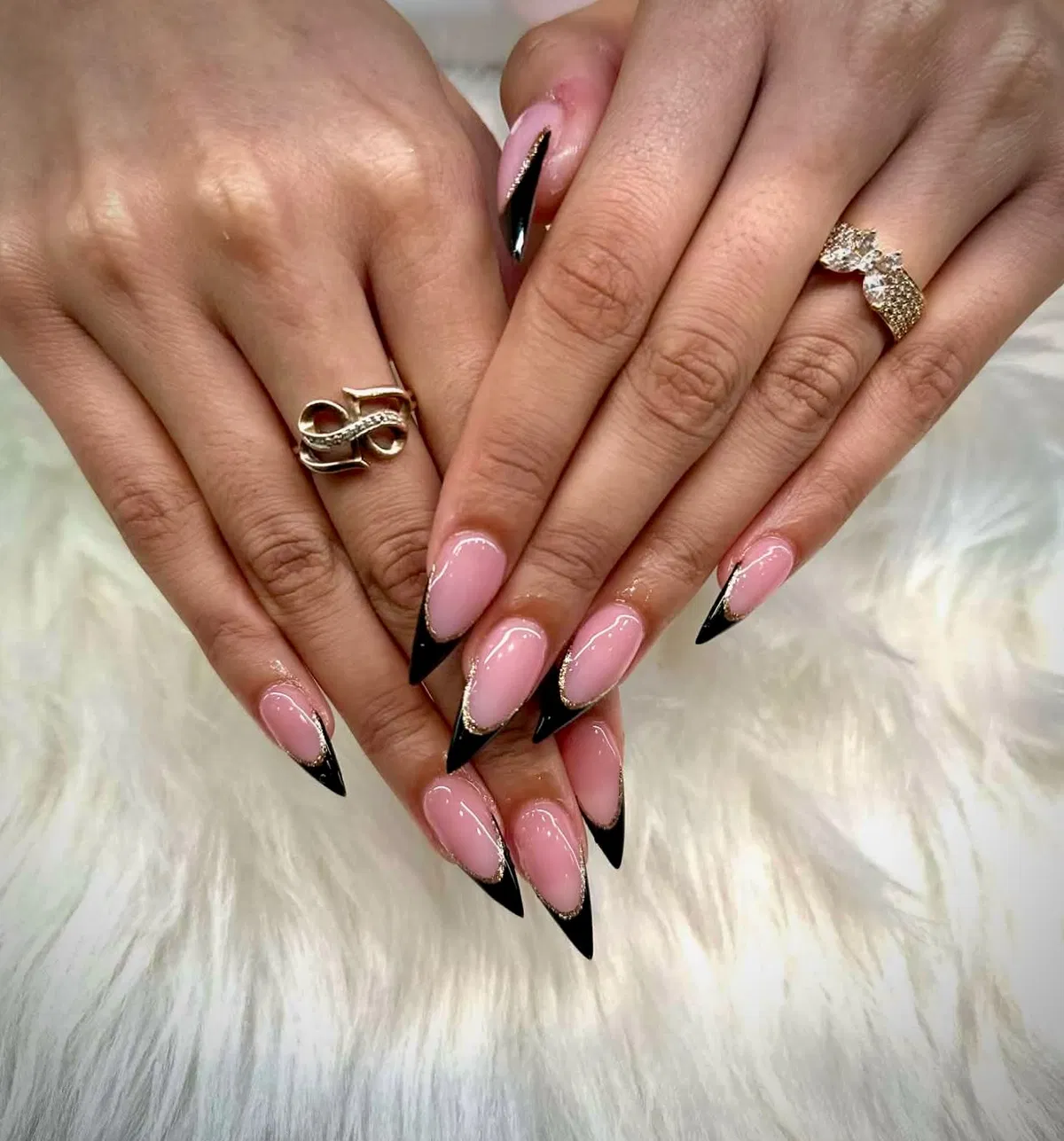 Black French tips edged with gold glitter