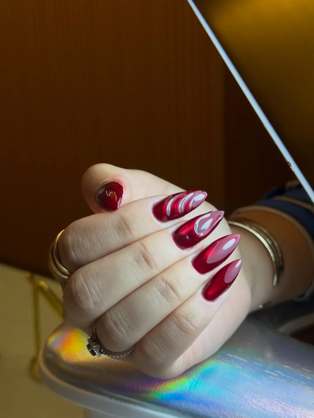 Translucent deep red almonds with white stripe accent