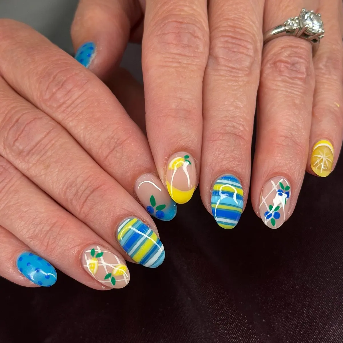 Stripes and fruit-style motifs in blue/yellow