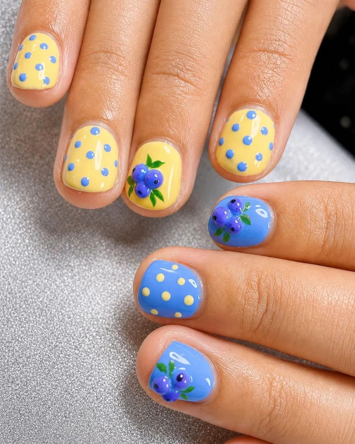 Polka dots with berry-and-leaf accents