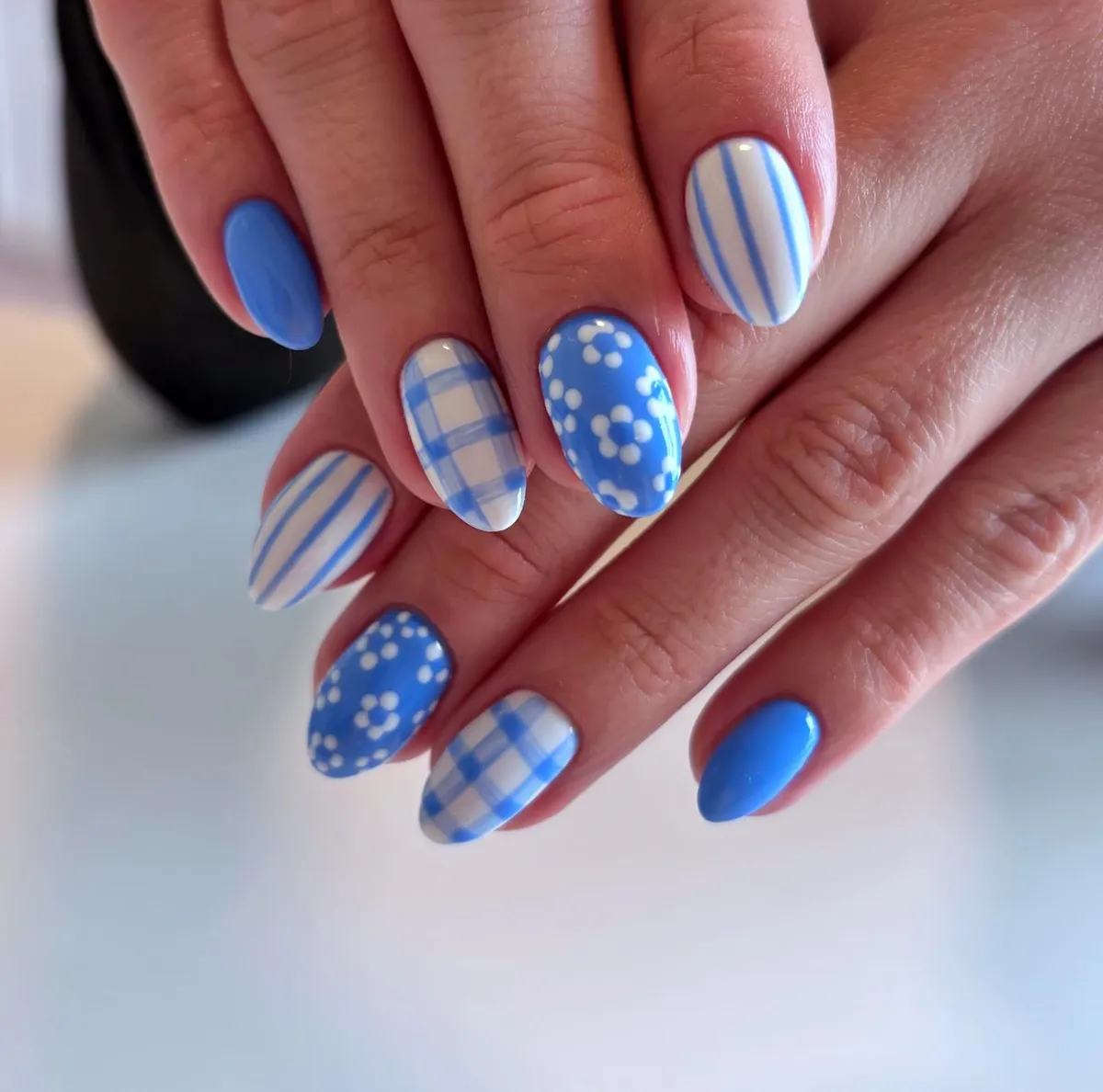 Mixed Blue Patterns: Plaid, Stripes, and White Floral Dots