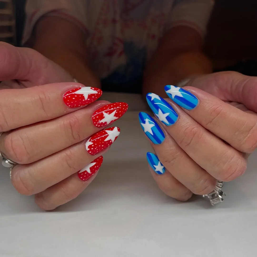 Red-and-blue star nails with dotted accents