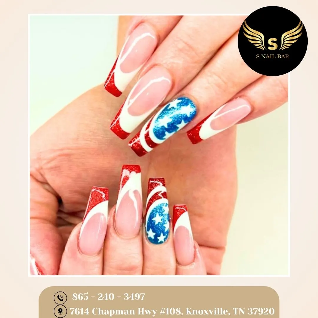Red glitter French tips with blue star accent nails