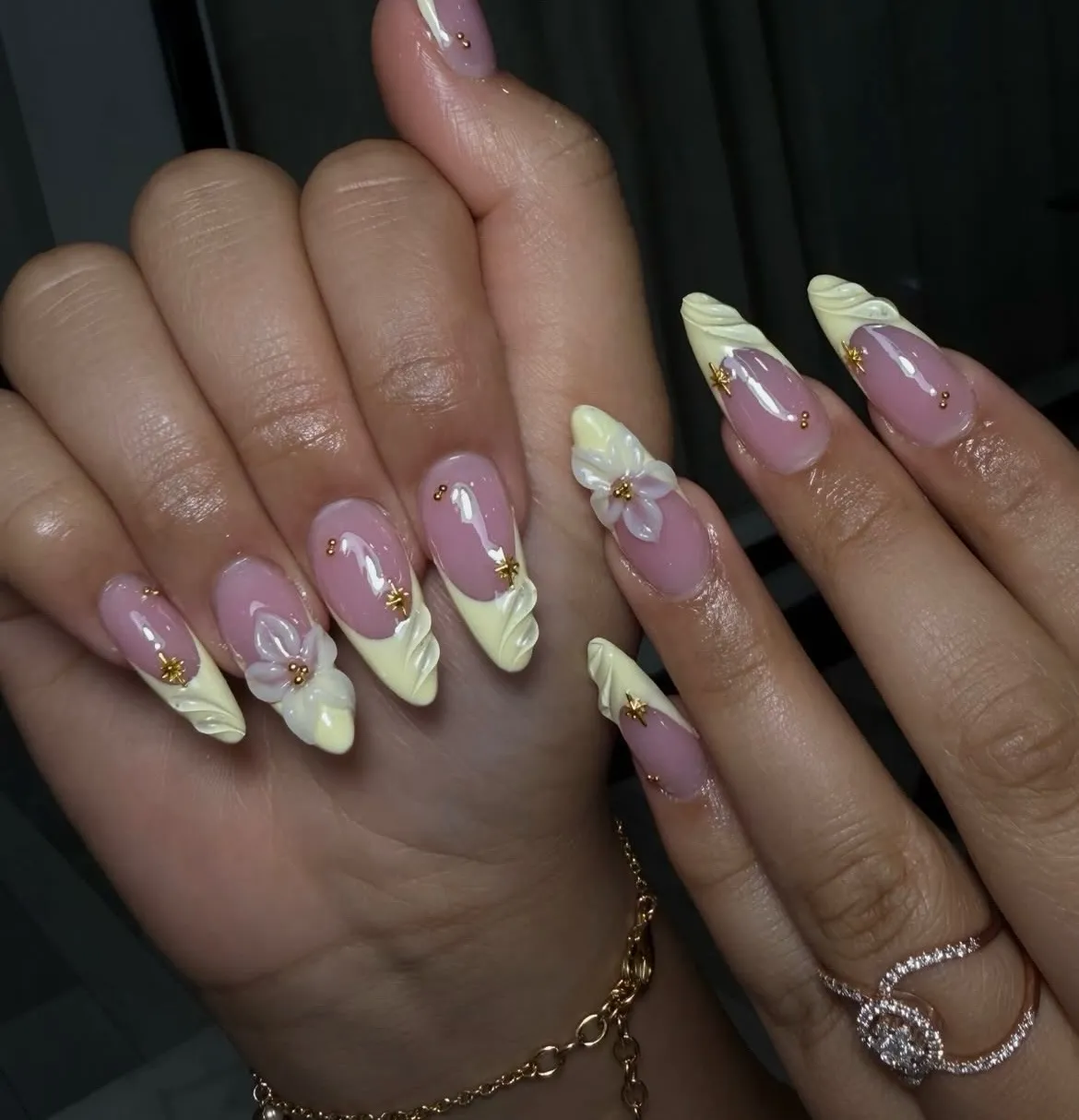 Raised yellow tips with 3D flowers and gold star accents