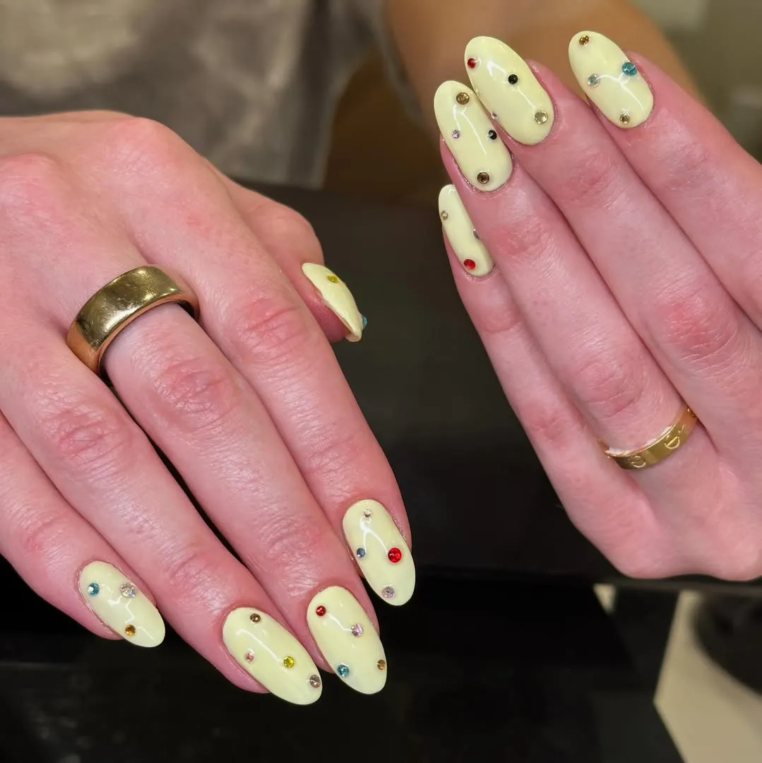 Solid buttery yellow with multicolor stud accents
