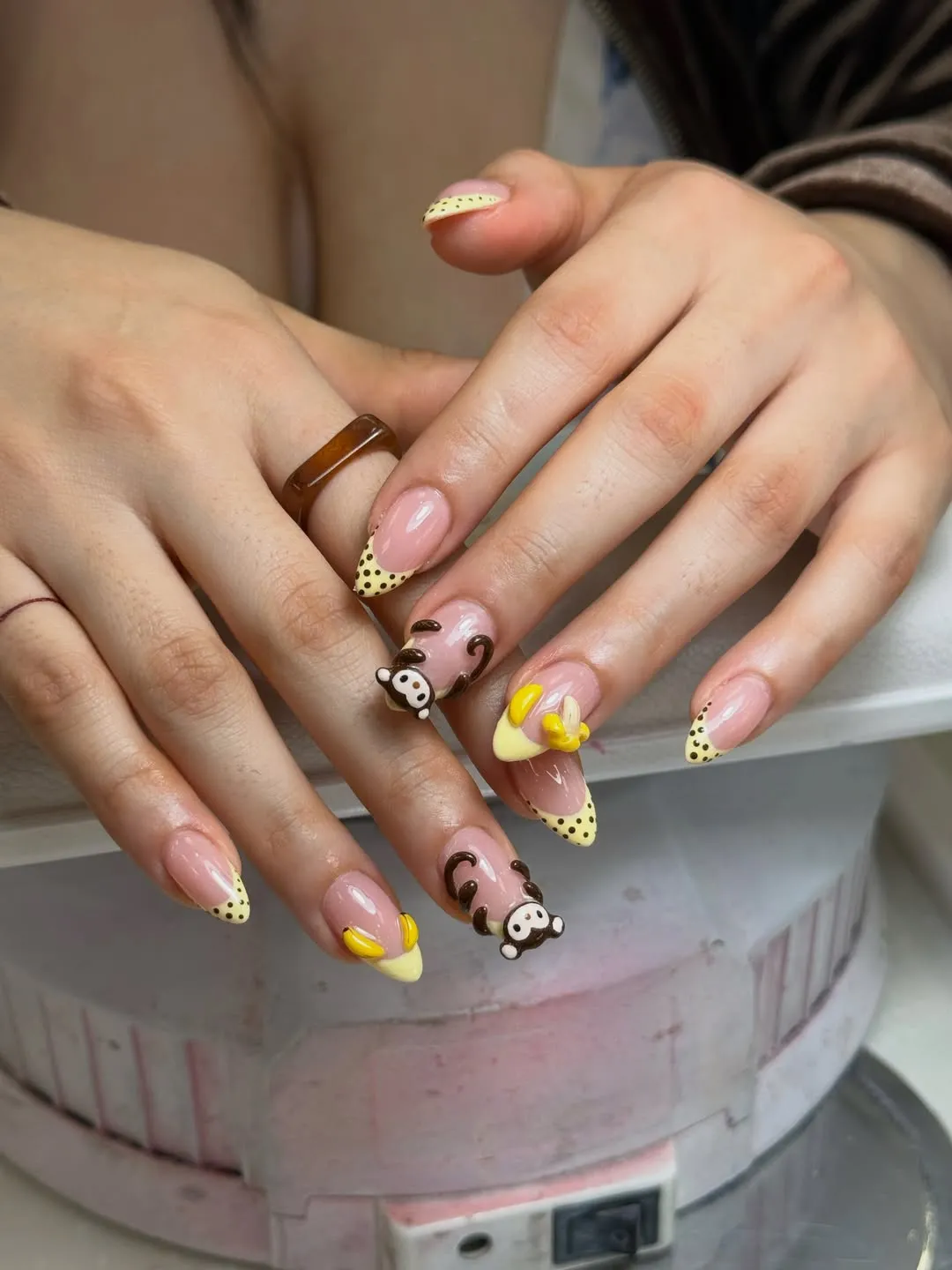 Polka-dot yellow tips with 3D character accents