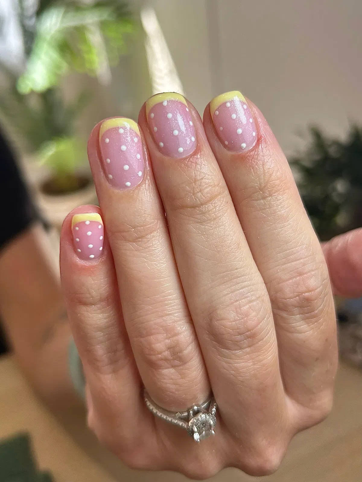Pink base with yellow tips and white polka dots