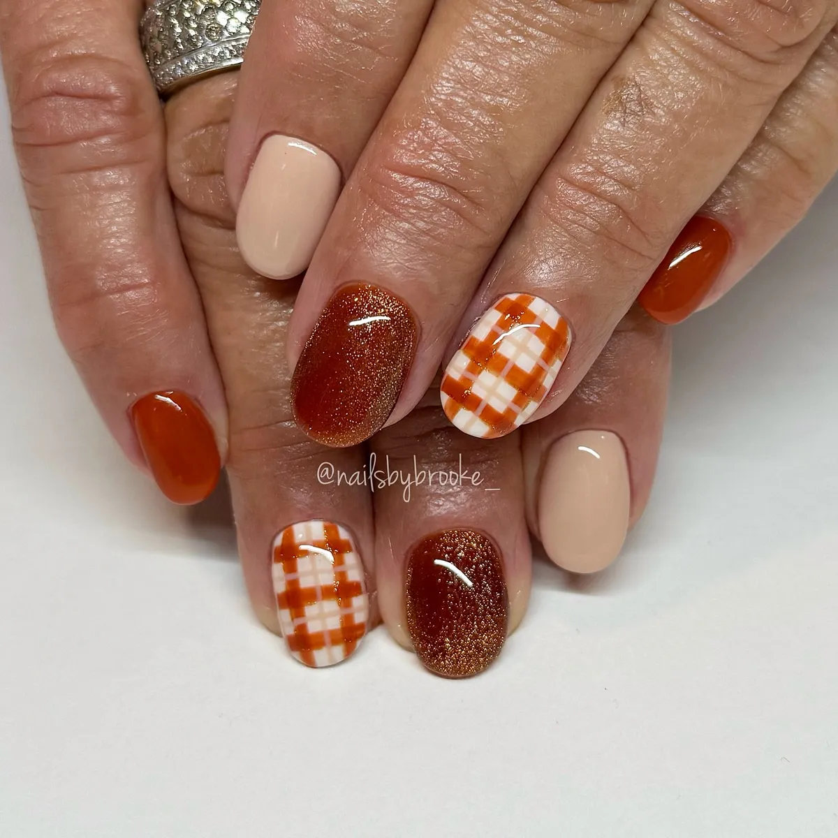 Orange-and-white plaid with nude and copper shimmer accents