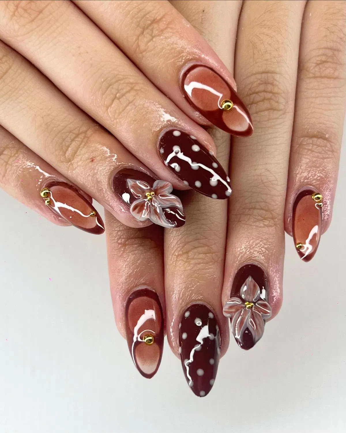 Burgundy dots with 3D floral accents