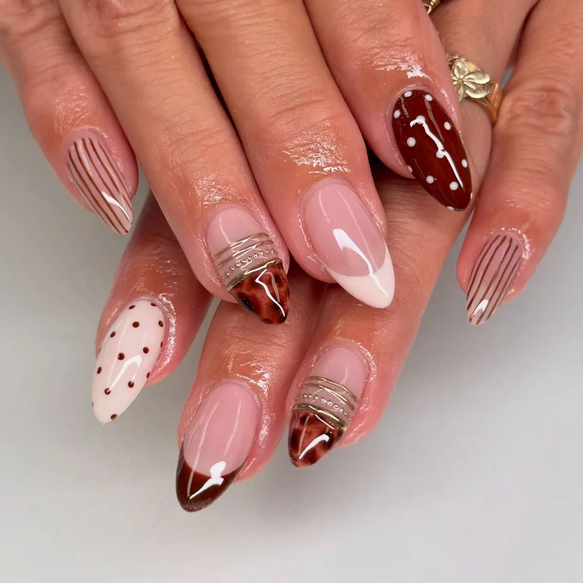 Mixed neutrals with stripes, dots, and marbled tips
