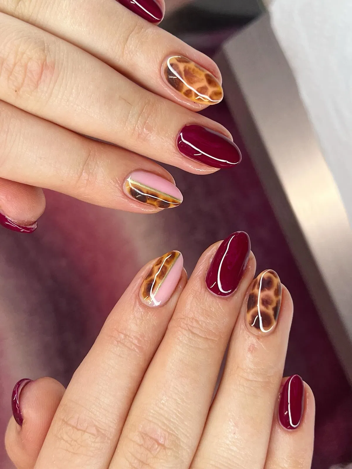 Burgundy solids with tortoiseshell and gold stripe accents