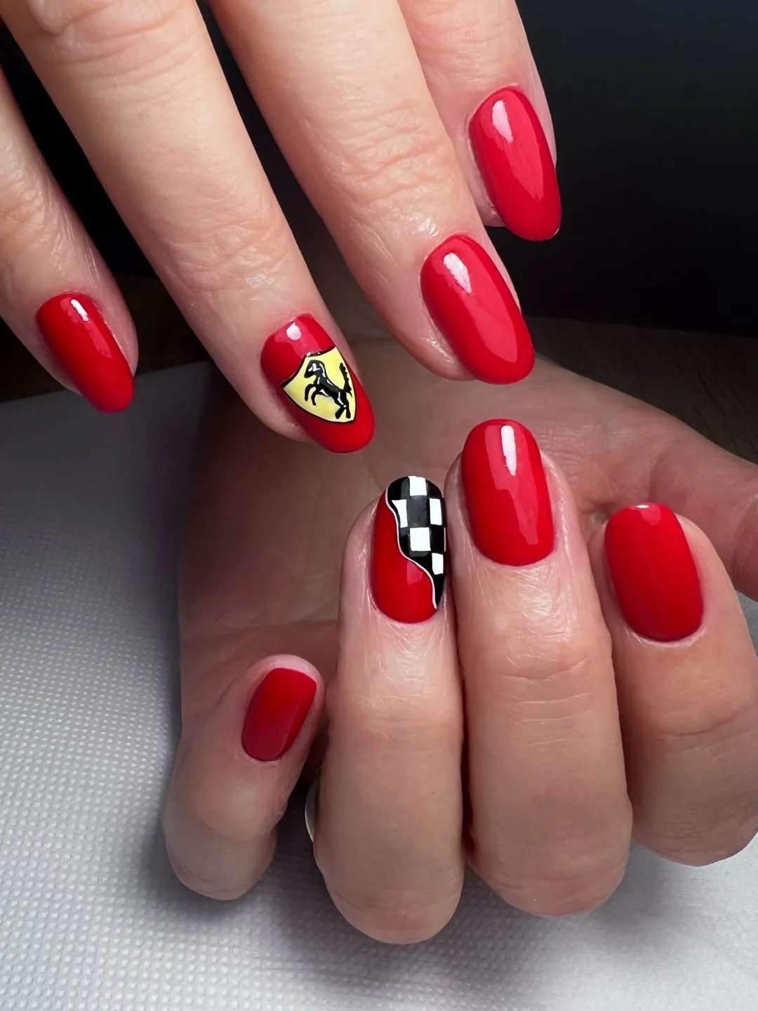Glossy red with yellow shield-horse and checkerboard accent