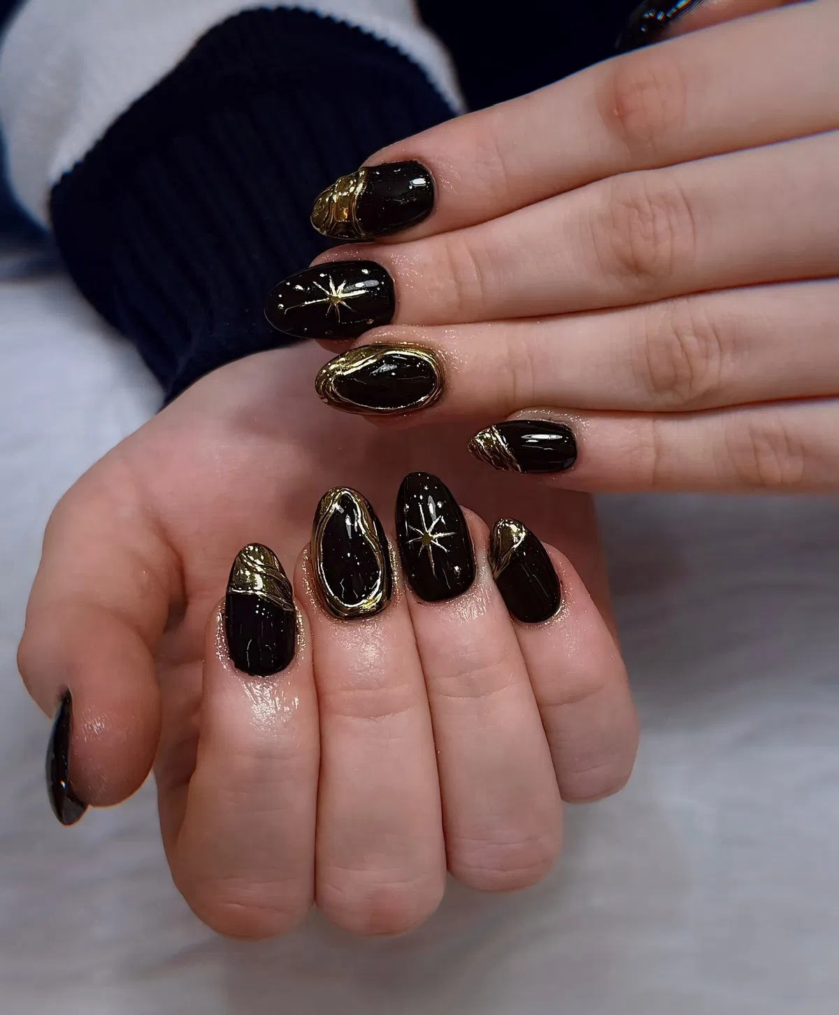Short glossy black with gold outlines and starburst accents