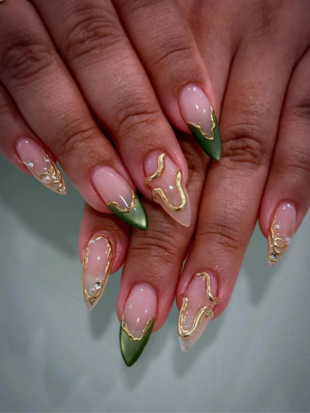 Green tips with irregular gold edging and raised gold waves