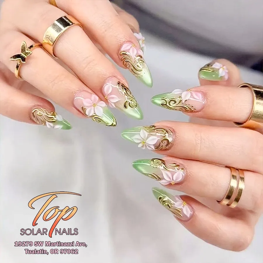 Light green tips with gold filigree and raised white flowers