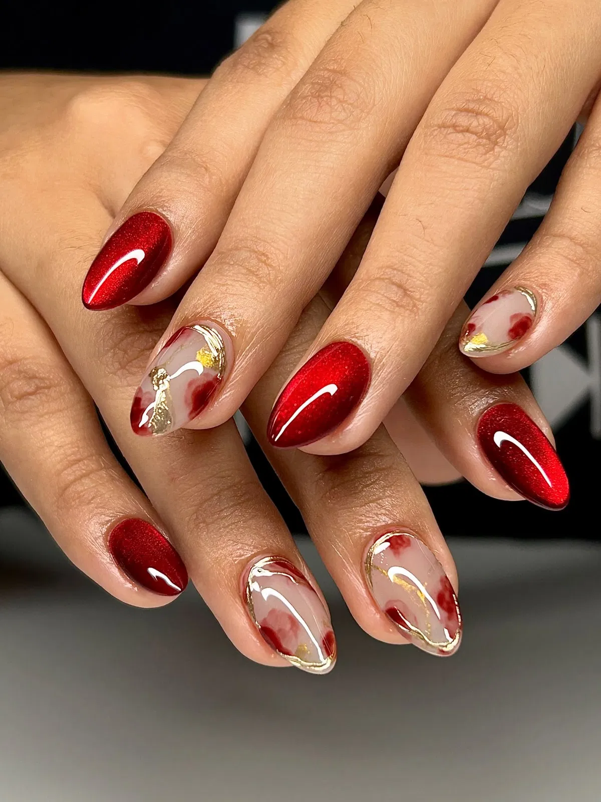Shimmery red solids with marbled nude-and-red gold accents