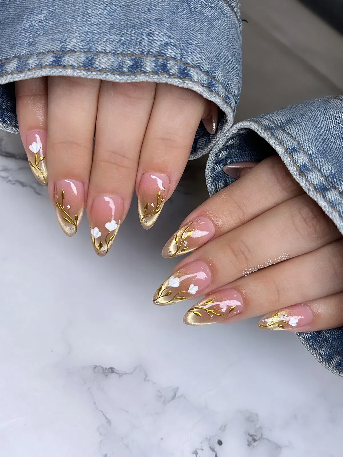 Gold ombré tips with white florals and vines