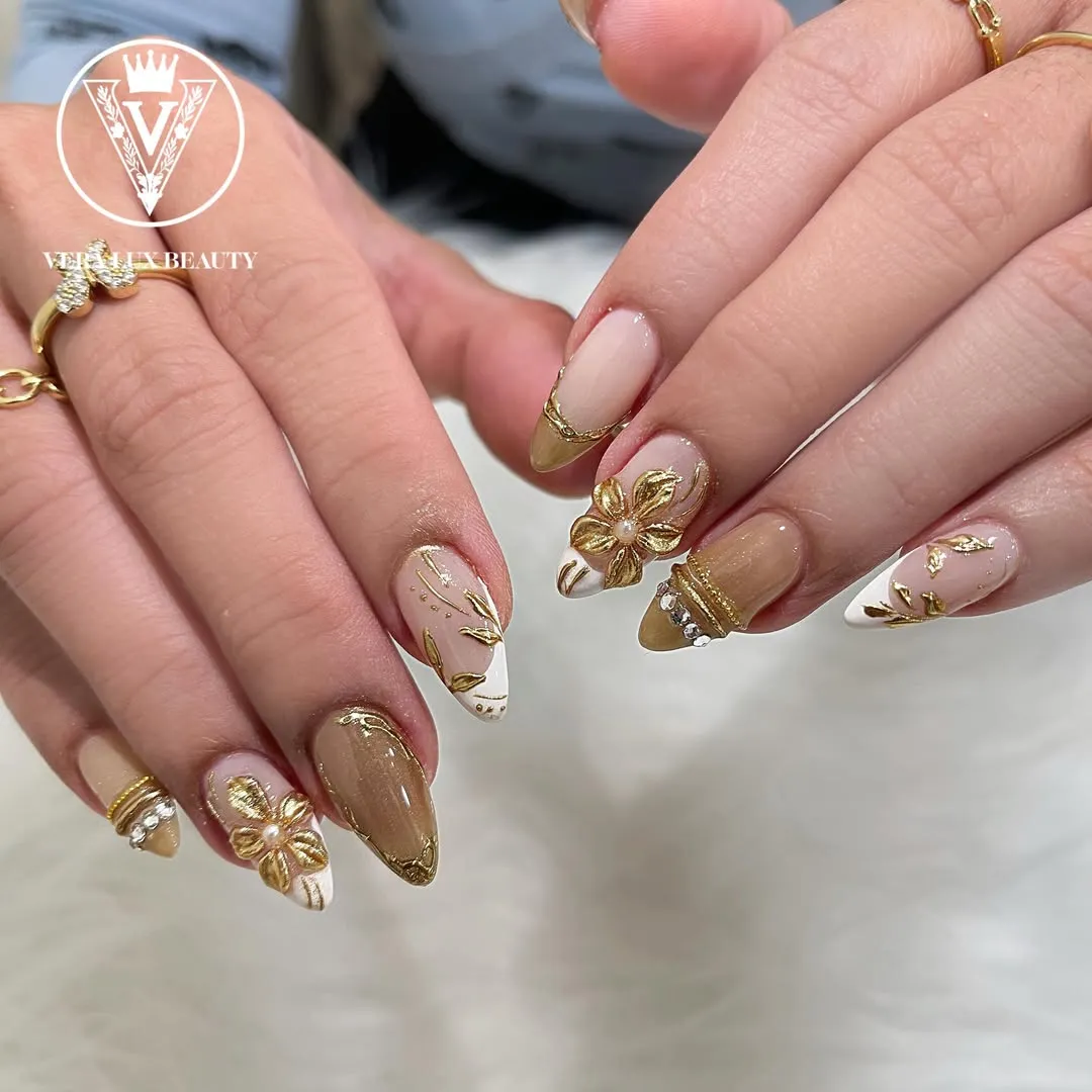 Raised gold florals with nude-and-white accents