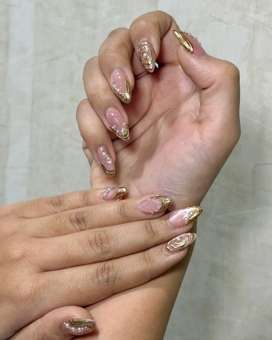 Pink Shimmer Almonds with Raised Gold Sculpting and Pearls